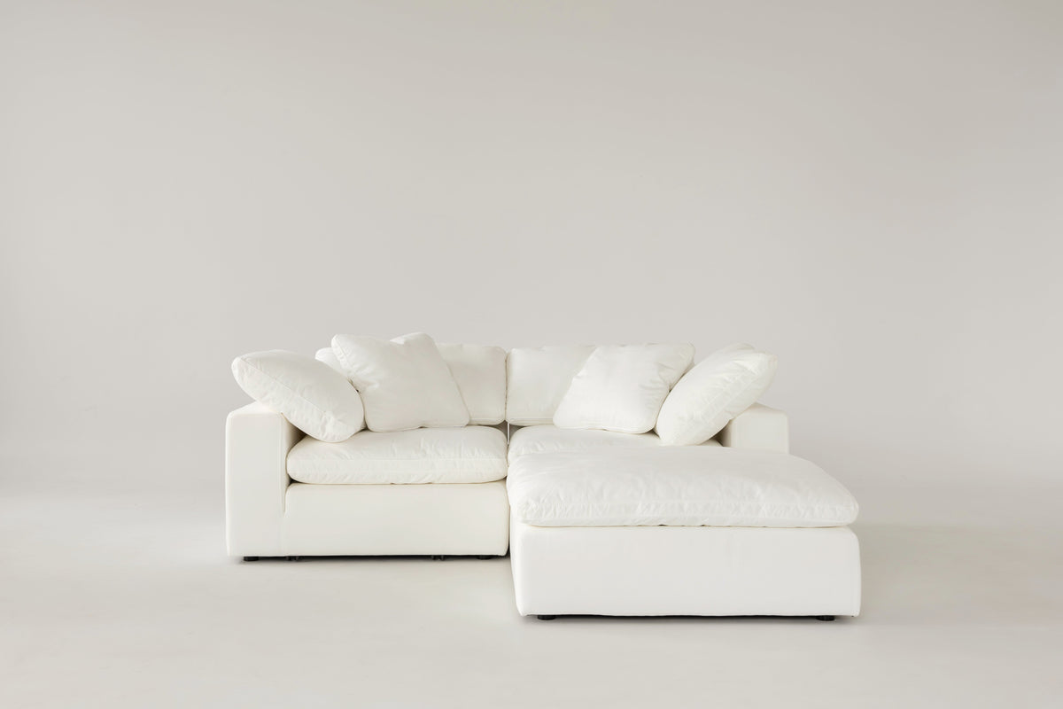 Cloud Classic two modules with an ottoman, in a studio space